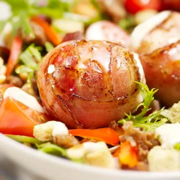 Meat balls wrapped in bacon Stock Photos