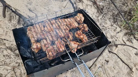Meat barbecue on the beach. Stock Footage 262431093