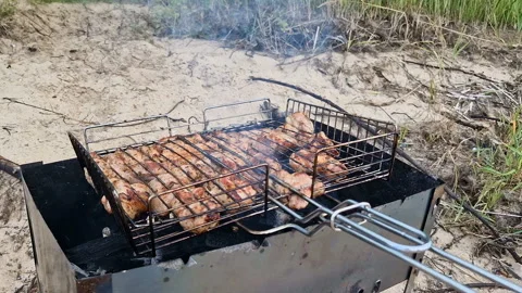 Meat barbecue on the beach. Stock Footage 262432530