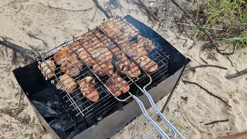 Meat barbecue on the beach. Stock Footage 262613784