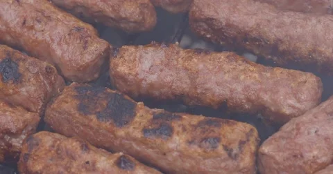 Meat on barbecue close up macro shot serbian food Video stock 62819201