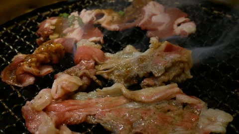 Meat barbecue concept : raw beef grill with fire on stove charcoal Stock Footage 135887407