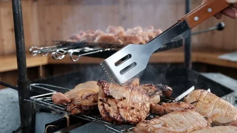 The meat on the barbecue. Kitchen. Stock Footage 81233853