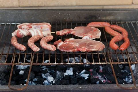 Meat on barbecue Stock Photos