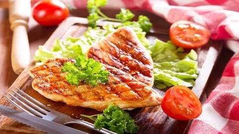 Meat on the barbecue Stock Photos