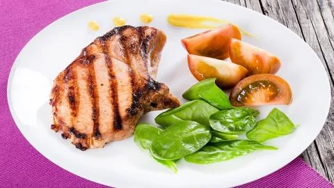 Meat on the barbecue Stock Photos