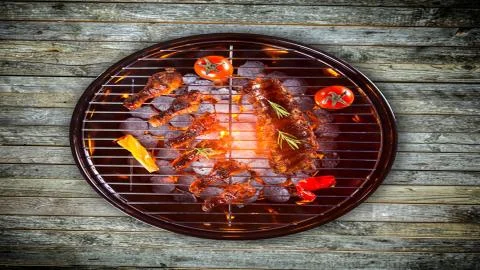 Meat on the barbecue Stock Photos