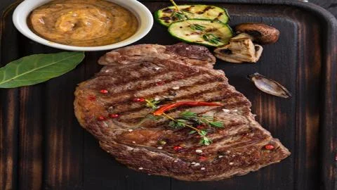 Meat on the barbecue Stock Photos