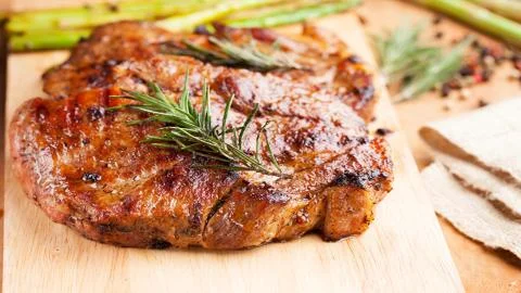 Meat on the barbecue Stock Photos