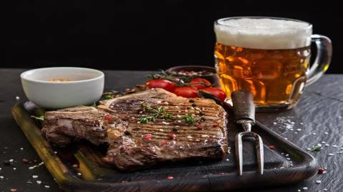 Meat on the barbecue Stock Photos