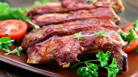 Meat on the barbecue Stock Photos