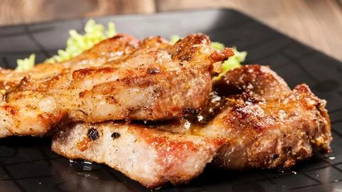 Meat on the barbecue Stock Photos