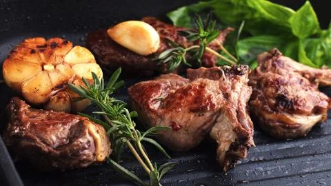 Meat on the barbecue Stock Photos