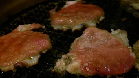 Meat barbecue. raw beef grill with fire on stove charcoal Video stock 135406462