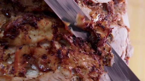 Meat being cut before making shawarma Stock Footage 128008665
