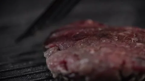 Meat being fried Stock Footage 64544612