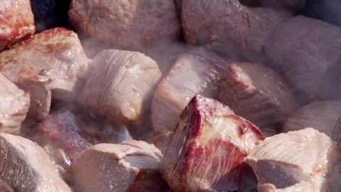 The meat is being fried Stock Footage 286841367