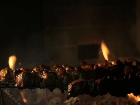 The meat being prepared on fire. Stock Footage