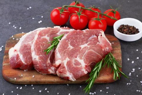 Meat on black surface Foto stock