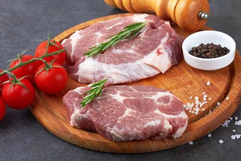 Meat on black surface Foto stock