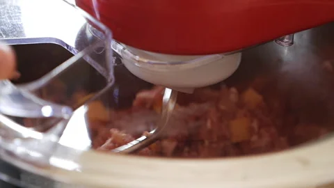 Meat in a blender. The process of grinding meat and potatoes. Use a blender to Stock Footage 127658680