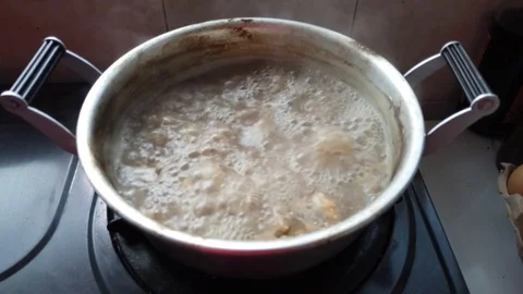 Meat boil in a pot. Stock Footage