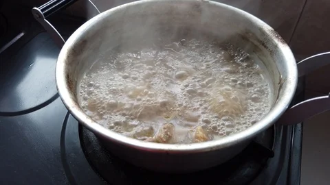 Meat boil in a pot. Stock Footage 105400480