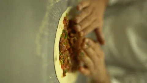 Meat bread is being prepared - Vertical Stock Footage 181847531
