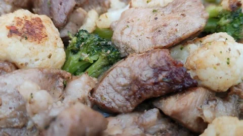 Meat with broccoli and cauliflower Stock Footage 168026355