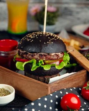 Meat burger with brown bread sauce Stock Photos