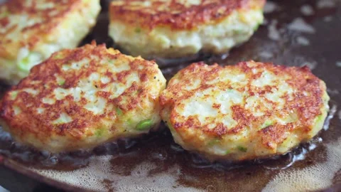 Meat chops are fried in frying pan in oil. Video stock 279712797