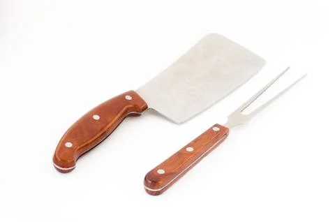 Meat cleaver. Meat fork Stock Photos
