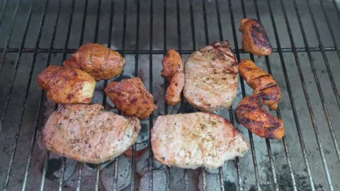 Meat in close up on a charcoal grill 3 00000000 Stock Footage 141318822