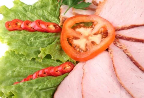 Meat close up with tomato Stock Photos