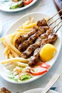 Meat cooked on fire Stock Photos