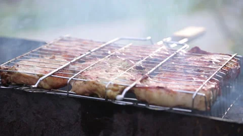 Meat Cooked On The Grill  Stock Footage 64986529
