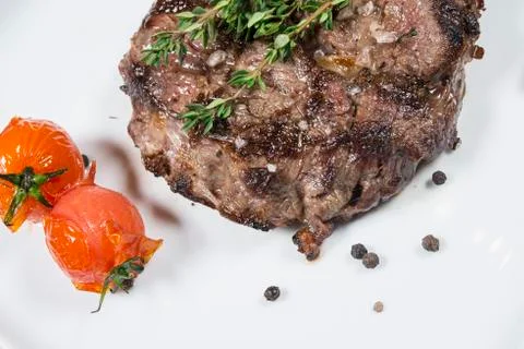 Meat cooked on the grill Stock Photos