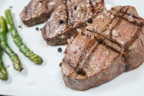 Meat cooked on the grill Stock Photos