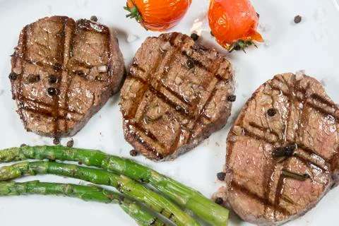 Meat cooked on the grill Stock Photos