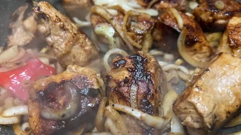 Meat is cooked with onion Stock Footage 232041818