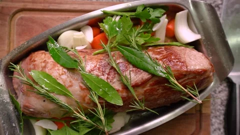 Meat Cooked In Oven Garnish With Fresh Green Herbs. High Angle Stock Footage 245815073