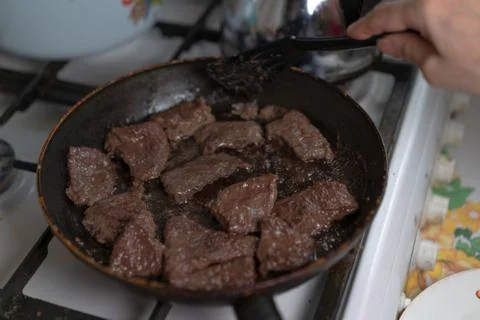 The meat is cooked in a pan Stock Photos