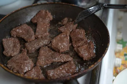 The meat is cooked in a pan Stock Photos