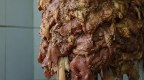 Meat cooked on a skewer  2 Stock Footage 21221213