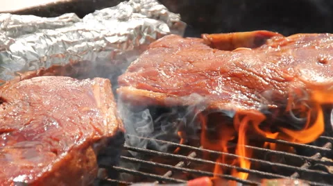 Meat, cooked using a grill. (1) Stock Footage 3981725