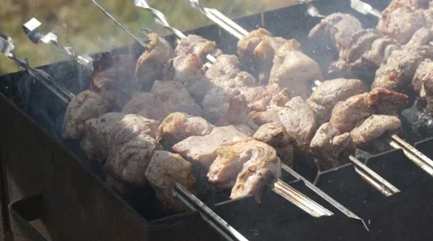 Meat is cooking on brazier Stock Footage 66351428