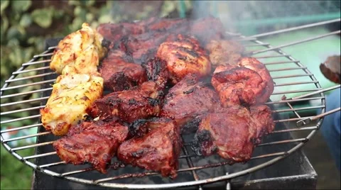 Meat cooking on a grill Stock Footage 49005666