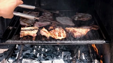 Meat cooking on the grill Stock Footage 138563416