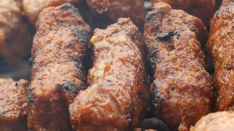 Meat Cooking Over A Grill Stock Footage 87718826