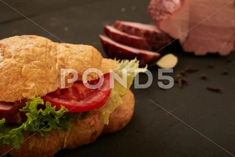 Meat croissant with ham Stock Photos